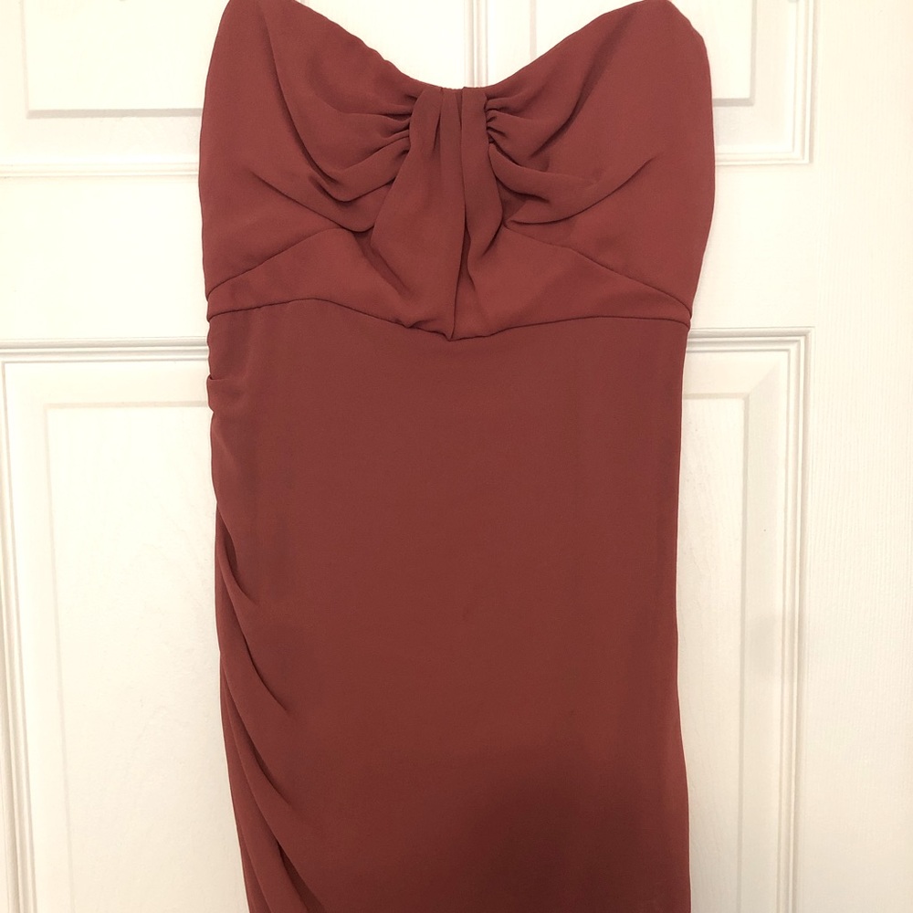Rosy-rust colored body-con dress. Size small.